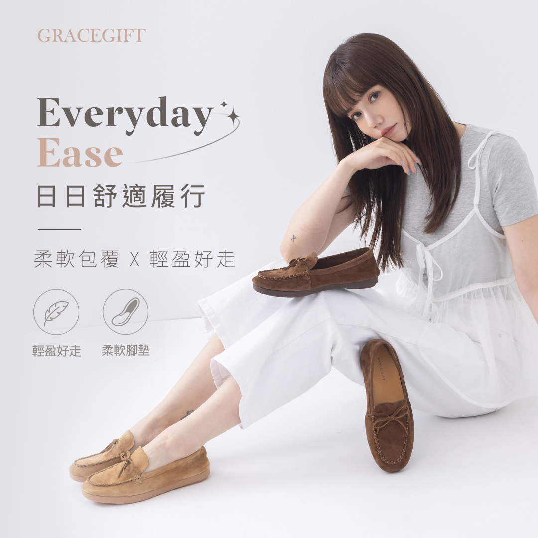GraceGift平價女鞋 時尚秀場 圓頭 舒適輕柔手工真皮蝴蝶結平底莫卡辛鞋 棕色