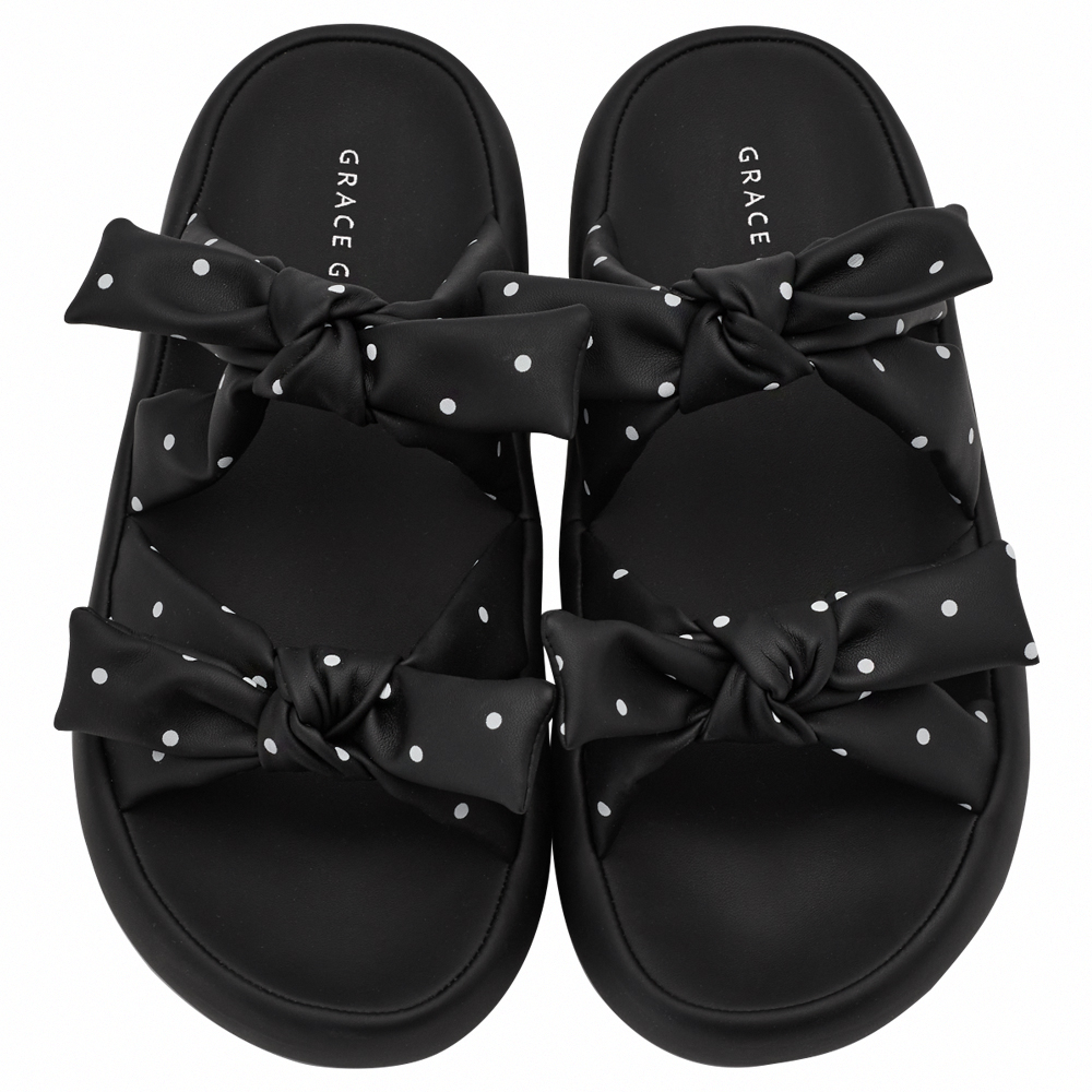 GraceGift平價女鞋 時尚秀場 圓頭 休閒甜感雙蝴蝶結可調節平底涼鞋 黑圓點色